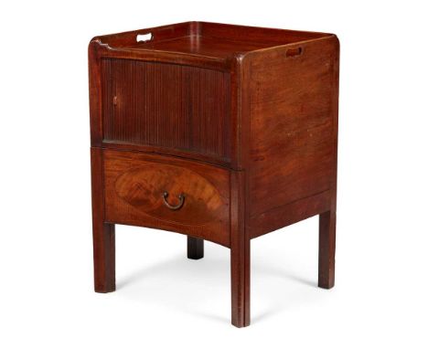 GEORGE III MAHOGANY BEDSIDE COMMODE  LATE 18TH CENTURY the tray top above a concave tambour door with drawer below, raised on