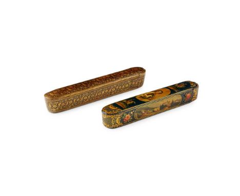 TWO LACQUERED PAPIER MÂCHE QALAMDAMS 19TH CENTURY both with rounded ends and sliding trays, the first decorated with a portra
