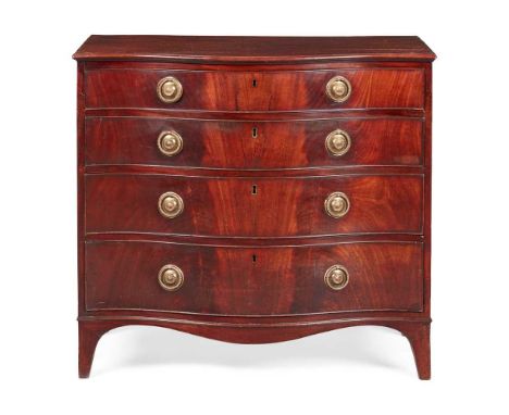 REGENCY MAHOGANY SERPENTINE CHEST OF DRAWERS  EARLY 19TH CENTURY  with four long graduated drawers with matched flame mahogan