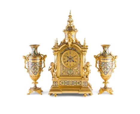 FRENCH RENAISSANCE REVIVAL GILT METAL AND CLOISONNÉ ENAMEL THREE PIECE CLOCK GARNITURE LATE 19TH CENTURY the arched cased wit