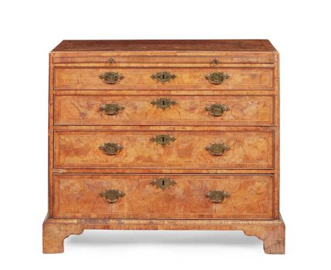 GEORGE I WALNUT CHEST OF DRAWERS  EARLY 18TH CENTURY, WITH ALTERATIONS the quarter-veneered and crossbanded top above a brush