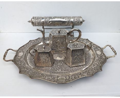 An early 20th century Indian silver (tested) presentation tea service with matching tray, 52 cm W, of tapering hexagonal form
