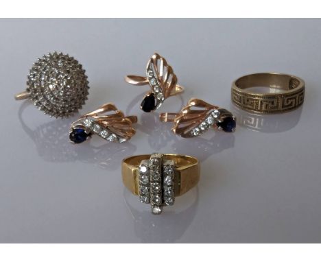 An 18ct gold vintage diamond cluster ring, size M, 5.75g; a pair of sapphire and diamond earrings on a 15 ct gold setting wit