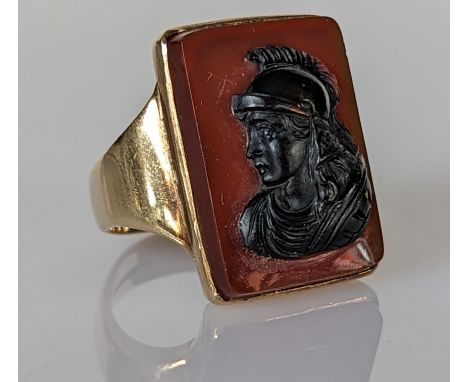 A carnelian cameo ring depicting a centurion on a 9ct gold mount, 23 x 15mm, hallmarked, 12g 