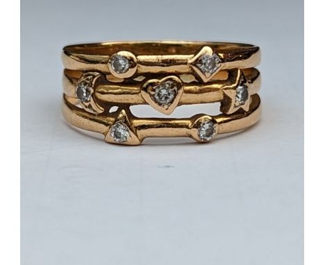 A yellow gold split shank ring with diamond decoration, size O, unmarked but test for 14ct, 4.2g