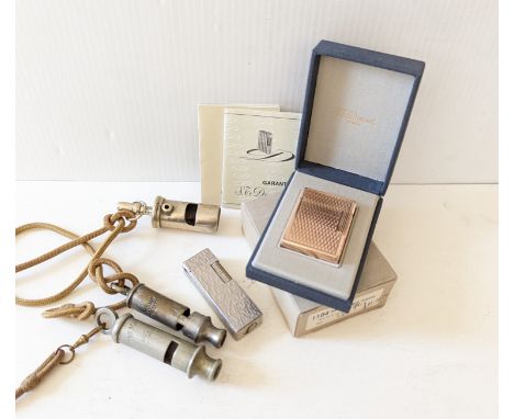 S J Dupont Paris gold plated lighter with heavy gold plating of 20 microns, 47 x 35mm, in original box and packaging; another
