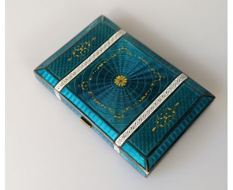 An early 20th century Austrian 900 standard silver gilt and guilloche enamel cigarette case, Vienna circa 1920, the all over 