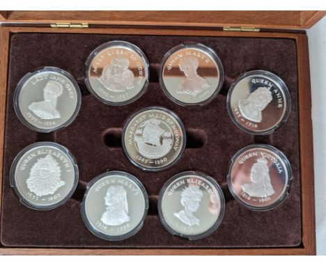 A Birmingham Mint 'Queens of the British Isles' fully hallmarked sterling silver medallion set, a total of nine encapsulated 