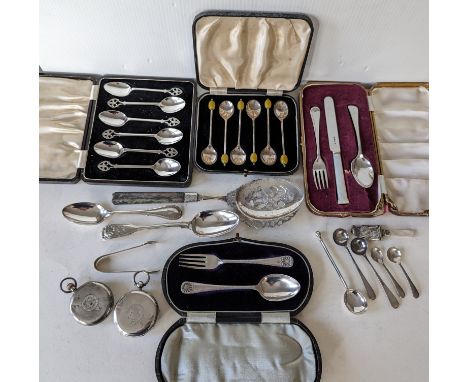 An Edwardian cased silver christening fork and spoon; another later, both by James Deakin & Sons, Sheffield; six cased silver