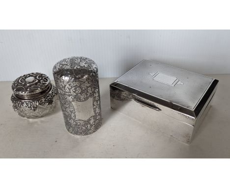 A late Victorian silver-cased perfume bottle with profuse seaweed etched decoration, flip-top lid, glass stopper (chipped), h