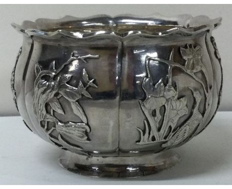 A novelty 19th Century Chinese silver bowl embossed with birds. By Hung Chong and Co. Approx. 160 grams. Est. £300 - £500.