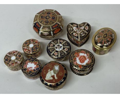 A selection of nine Royal Crown Derby trinket boxes. Est. £20 - £30.