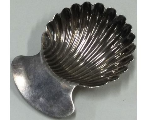A Hester Bateman silver caddy spoon with fluted bowl. London c1780. Approx. 5 grams. Est. £100 - £150.
