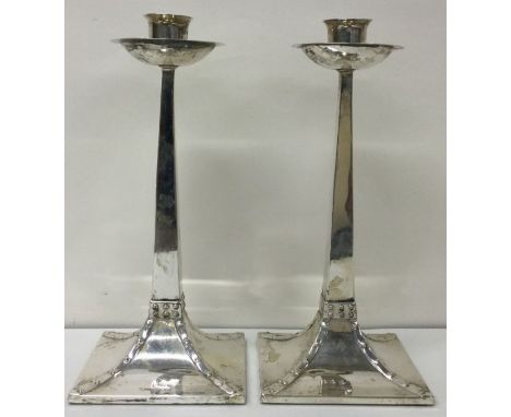 A pair of Art Deco Victorian silver candlesticks with beaded design. Sheffield 1896. By James Dixon and Sons. Approx. 773 gra