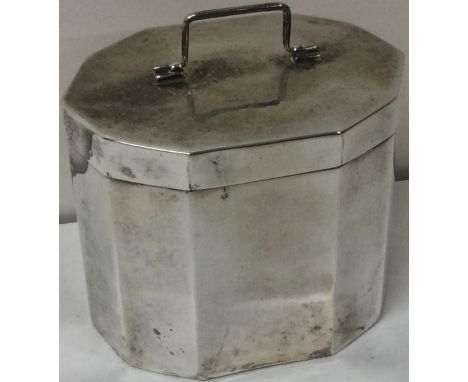 An Art Deco silver tea caddy with hinged lid. Birmingham 1913. By William Neale. Approx. 130 grams. Est. £100 - £150.