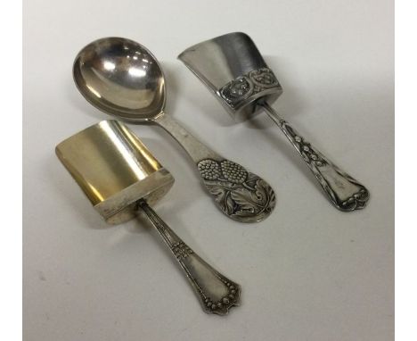 Three Continental silver caddy spoons. Approx. 34 grams. Est. £30 - £40.