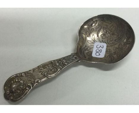 A heavy Kings' pattern silver caddy spoon. London. By JS. Approx. 25 grams. Est. £30 - £40.