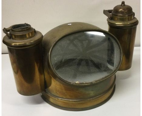 A heavy brass ships compass mound. Est. £30 - £50.