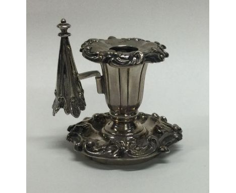 A Victorian silver chamberstick with removable nozzle. London. Approx. 56 grams. Est. £20 - £30.