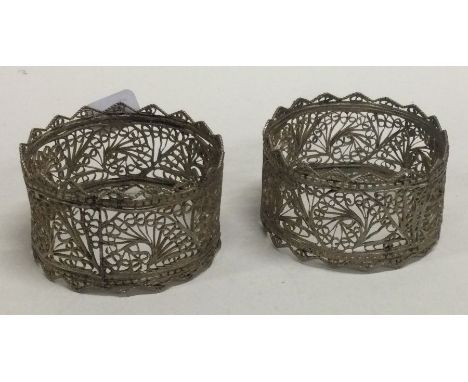 A pair of Continental silver napkin rings. Approx. 29 grams. Est. £20 - £30.