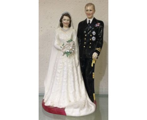 ROYAL DOULTON, ROYAL WORCESTER: Two bone china figures entitled "HM The Queen and HRH The Duke of Edinburgh, Her Majesty Quee
