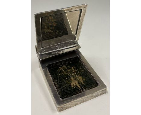 An engine turned gentleman's silver combination pen and card holder. London 1926. By Asprey and Co.  Approx. 181 grams. Est. 