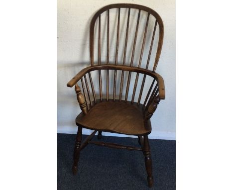 A good stick back Windsor chair. Est. £50 - £80.