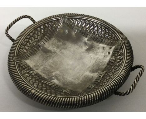 A very rare early 20th Century Russian trompe l'oeil silver bread basket. Approx. 187 grams. Est. £1500 - £2000.