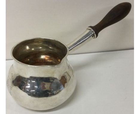 A large Britannia Standard Queen Anne silver brandy pan. London 1710. Approx. 670 grams. Est. £600 - £800.