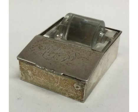 An unusual silver stamp case with glass roller and hinged lid. Birmingham. Approx. 141 grams. Est. £40 - £60.