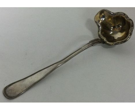 An early German 19th Century silver toddy ladle. Makers mark only.  Approx. 24 grams. Est. £20 - £40.