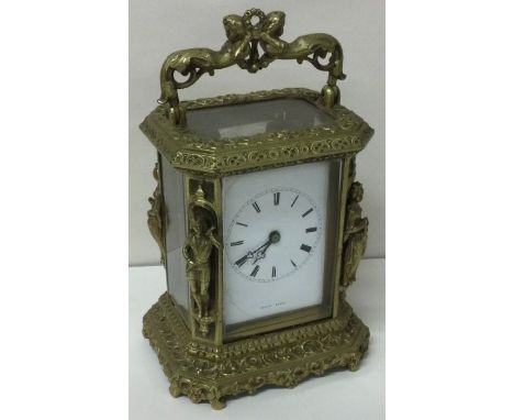 A large French striking carriage clock with white enamelled dial. By Lucien of Paris. Est. £200 - £300.