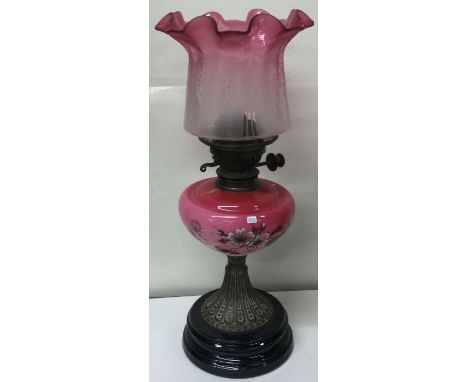 A good cranberry glass lamp together with matching shade. Est. £80 - £120.