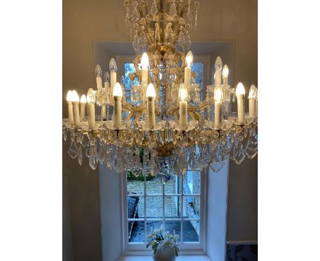 A massive Continental glass chandelier. Est. £250 - £300.