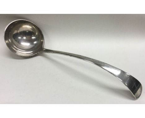 A heavy OE pattern silver soup ladle with crested decoration. Approx. 301 grams. Est. £120 - £150.