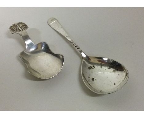Two silver caddy spoons. Birmingham 1899 and 1936. Approx. 30 grams. Est. £30 - £40.