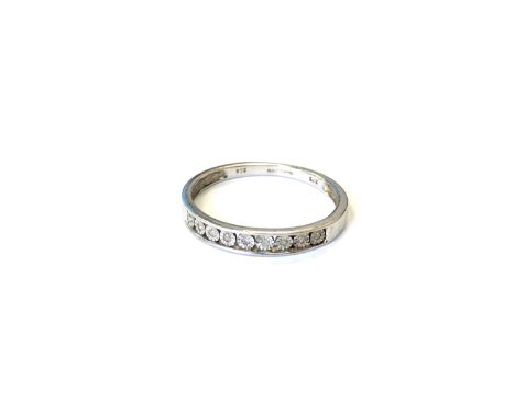 A 9ct white gold diamond half eternity ring, size O CONDITION REPORT: 1.6g