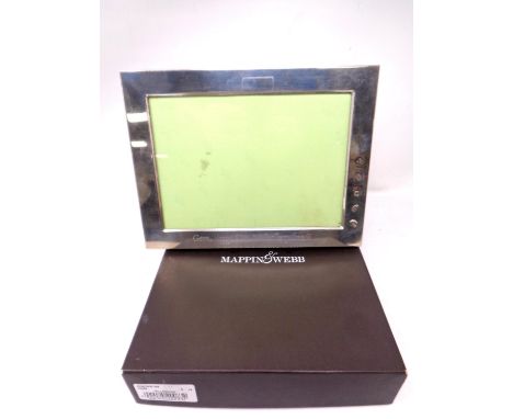 A Mappin &amp; Webb silver photo frame with dedication, in box.