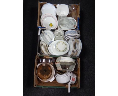 Three boxes containing a large quantity of assorted dinnerware, Pyrex dishes, kitchenalia together with a Nao figure.