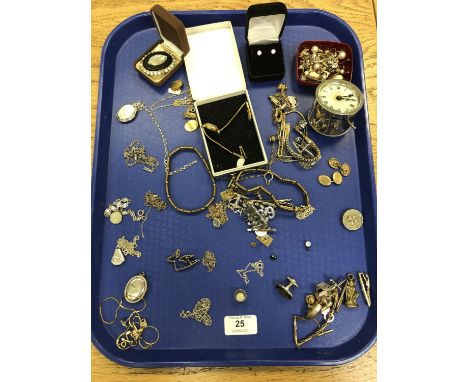 A tray of antique and later jewellery including silver locket and chains, cuff links, earrings, small bedside clock etc 