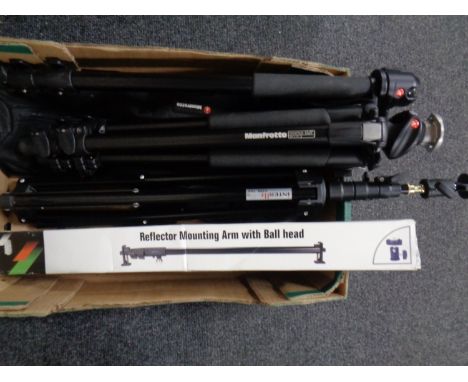 A box containing Manfrotto camera tripod in bag together with Manfrotto camera pole, a further tripod and a reflector mountin