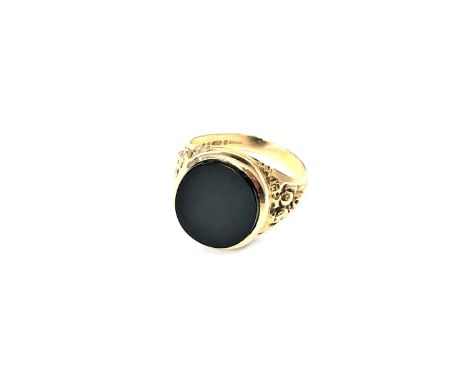 A 9ct gold black onyx signet ring, size K CONDITION REPORT: 4.4g