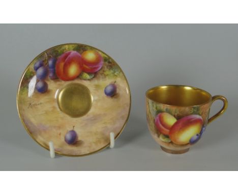 A ROYAL WORCESTER FRUIT DECORATED MINIATURE CUP & SAUCER the saucer signed by Freeman  Provenance: The Estate of Paul Rees FR