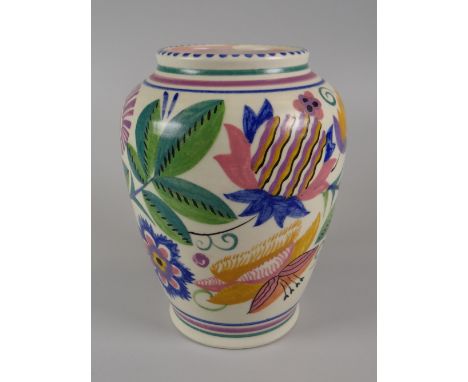 A POOLE POTTERY by Truda Carter and decorated by Gladys Hallett with bright exotic flowers and foliage, 17cms high