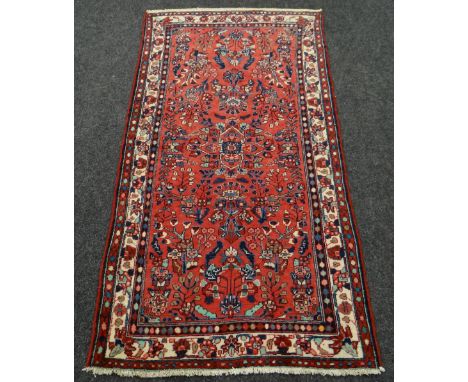 RED GROUND PERSIAN HAMERDAN VILLAGE RUG with all over design, 107 x 208cms