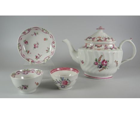 A NEW HALL TEAPOT circa 1780 with fluted oval body and cover together with a New Hall tea-bowl and saucer  Provenance: The Es