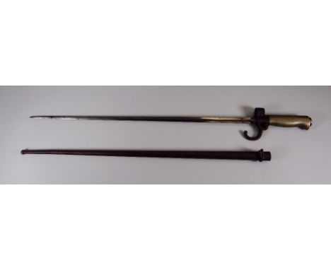 A LONG WW1 PERIOD CRUCIFORM BAYONET with scabbard and brass handle and marked with a letter 'B' in lozenge, 64cms long Key wo