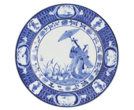BLUE AND WHITE 'LA DAME AU PARASOL' DISHDESIGN ATTRIBUTED TO CORNELIS PRONK (DUTCH, 1691–1759), EDO PERIOD painted with a gra