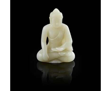 CELADON JADE CARVING OF SEATED BUDDHA SHAKYAMUNIdepicted seated in vajraparyankasana with the right hand in bhumisparsha mudr