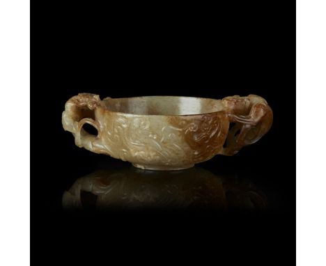 CELADON AND RUSSET JADE TWIN-HANDLE LIBATION CUPQING DYNASTY, 18TH/19TH CENTURY the two handles formed as chilong dragons con